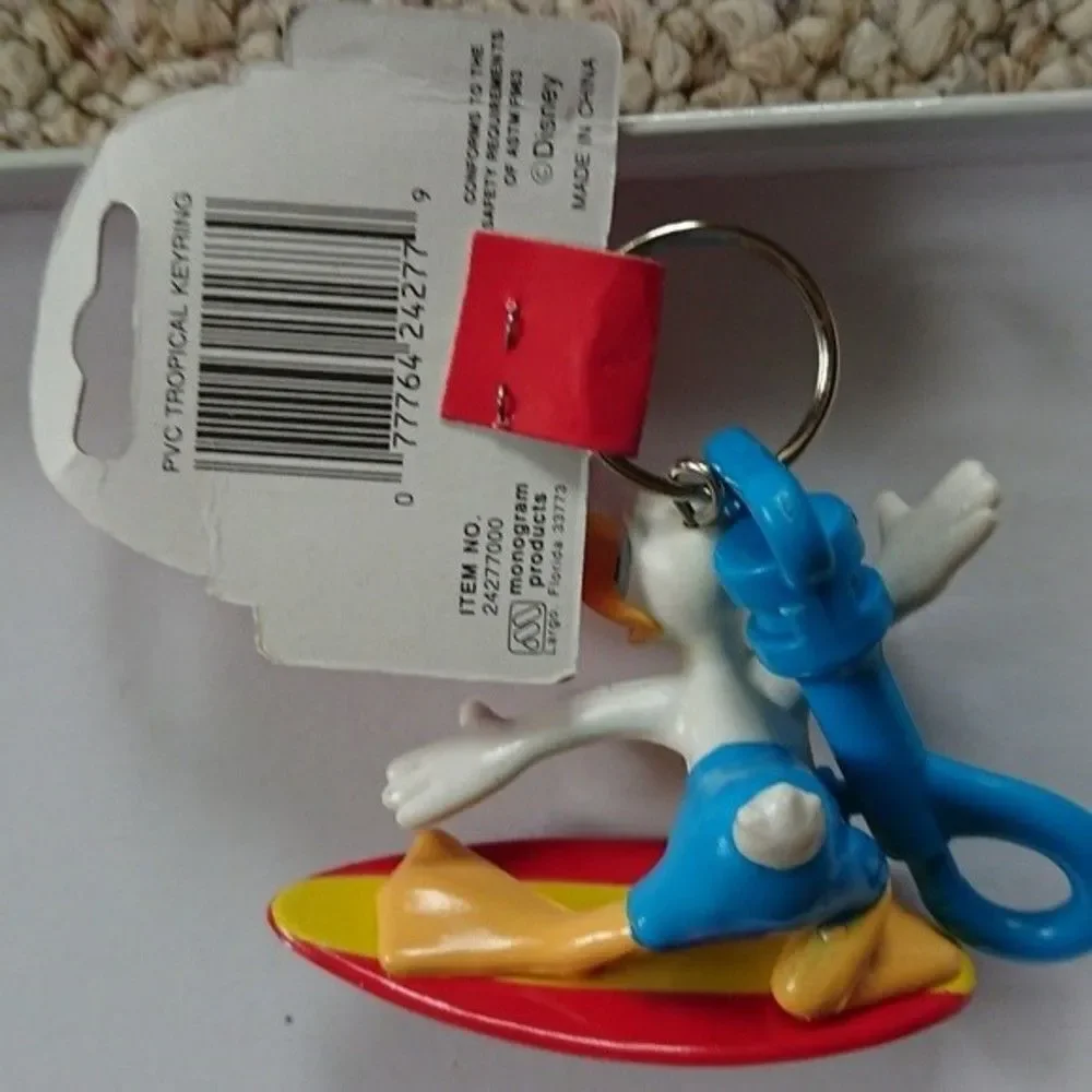 New vintage Donald Duck surfboard keychain with clip